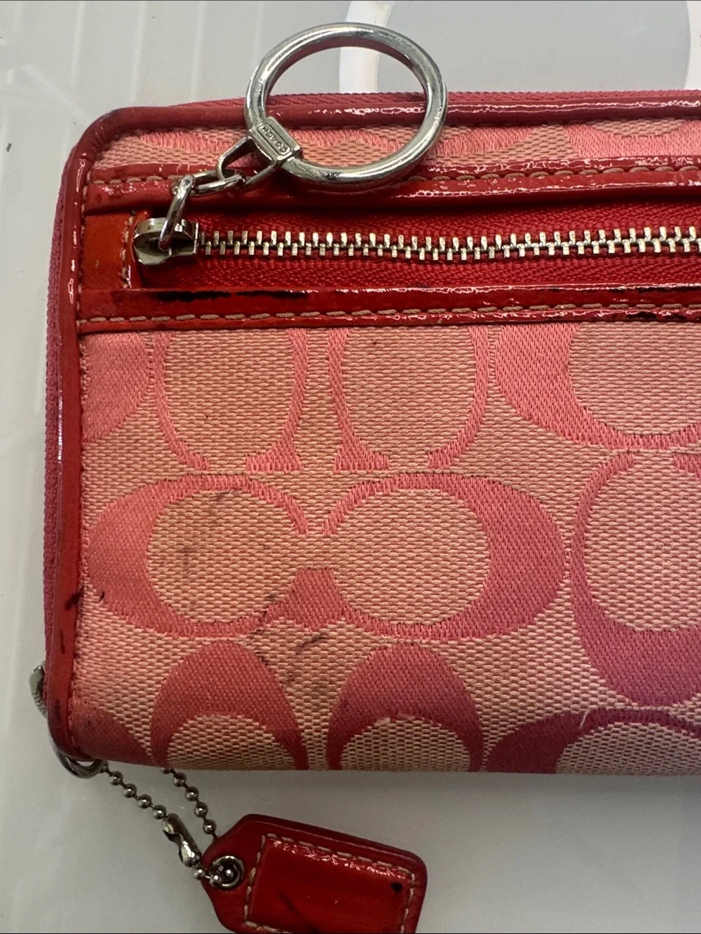 Coach Signature Zip Around Wallet in Pink and Pink Trim